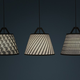 Illustration for article titled Poke Out Parts of This Perforated Lamp Shade To Make Your Own Pattern